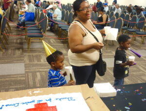 Would you believe these two little boys didn't like cake? They did like party hats.