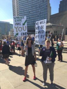 Weitz fellow Tori Ostenso (left) and Appleseed law clerk Kasey Ogle were among the Nebraskans urging for stronger reforms at the CFPB hearing.